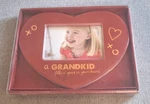Grandkid Fills Your Heart Ceramic Picture 3.5" X Photo Frame,. Fixed Price $12.49.