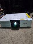 Epson Powerlite L610U Laser Projector - Low Hours Under 2400 For Repair Parts. Fixed Price $699.99.