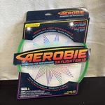 Aerobie Green Skylighter High Performance Frisbee Light-up Flying 12" Disc. Fixed Price $18.00.